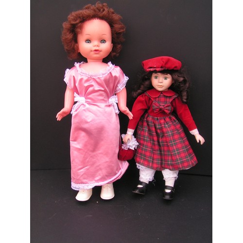 278 - Beautiful eyed blinking Pram doll and Tartan doll with synthetic body limbs/head and soft material b... 