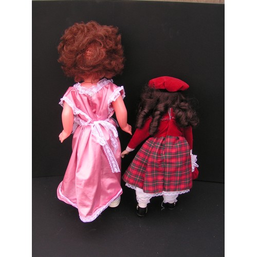 278 - Beautiful eyed blinking Pram doll and Tartan doll with synthetic body limbs/head and soft material b... 