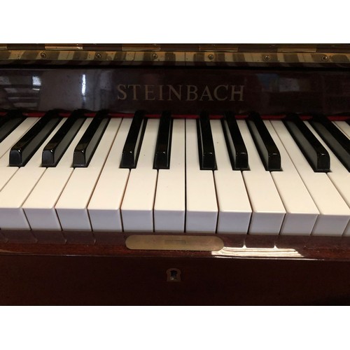 340 - Steinbach 108cm modern upright piano. Mahogany case. Full length (88 key) keyboard. 3 pedals. String... 