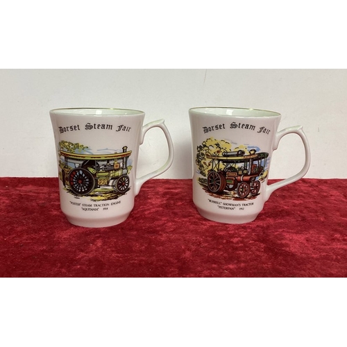 24 - Two Dorset Steam Fair Mugs with Burrell and Foster traction engines