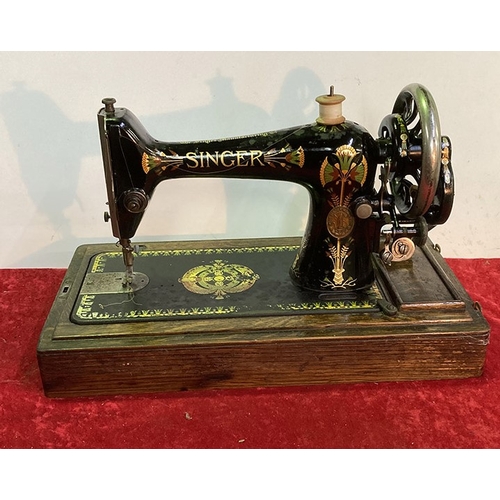 71 - Vintage boxed Singer hand sewing machine with original parts in good order