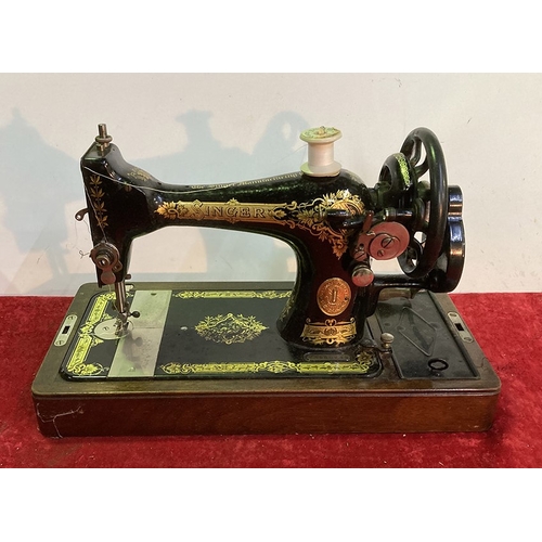 72 - Two cased vintage Singer hand sewing machines