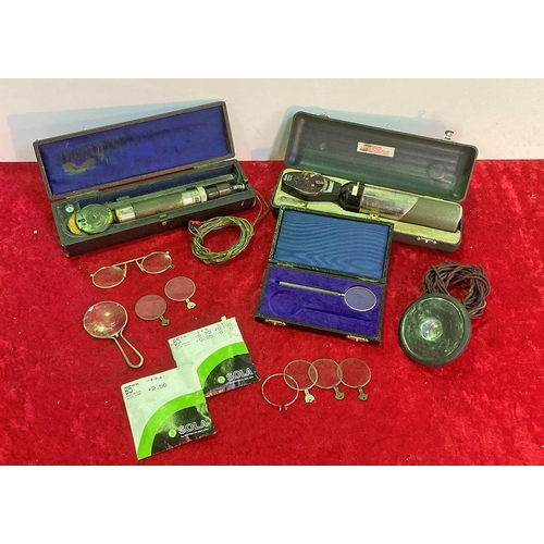 102 - Collection of vintage optician's equipment