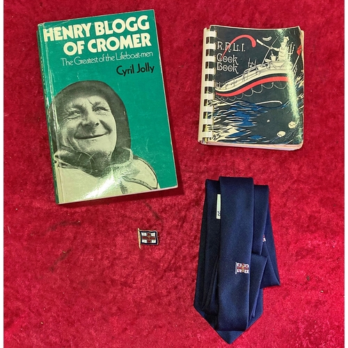 339 - Collection of RNLI items inc tie, books and pin badge