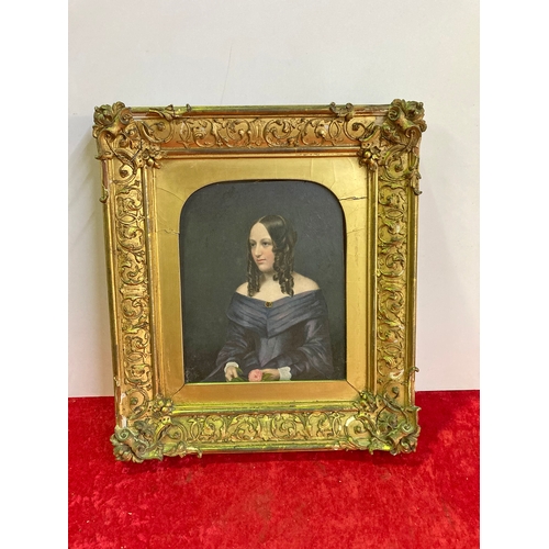 407 - Mid 19thC oil painting, portrait of a seated lady, holding a pink flower, in antique gilt frame. Ind... 