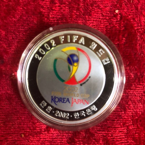 620 - 2002 FIFA World Cup commemorative silver coin, 30g, boxed with paperwork (box faded)