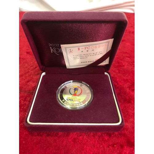 620 - 2002 FIFA World Cup commemorative silver coin, 30g, boxed with paperwork (box faded)