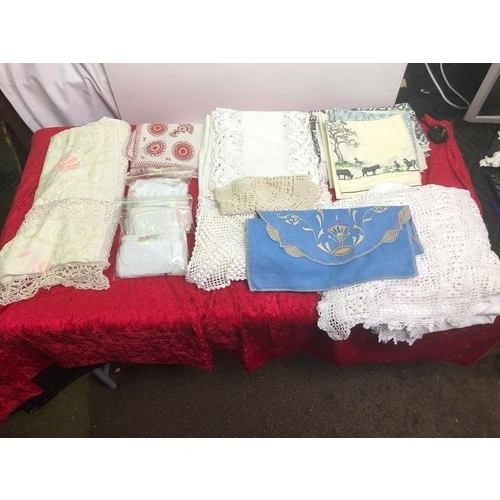 655 - Box of linen including table cloths and handkerchiefs