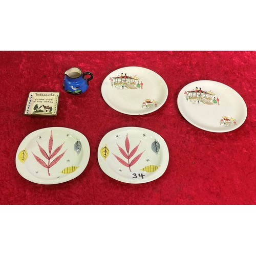 34 - 2 retro Royal Swan Flamingo plates, 2 Meakin Carousel plates and a Babbacombe pottery motto ware dis... 