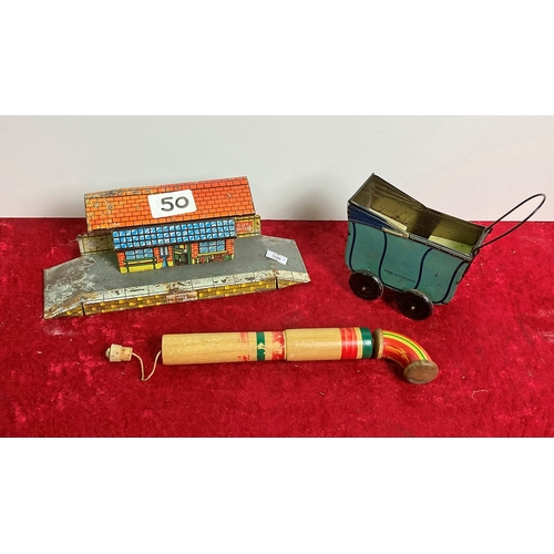 50 - Vintage tin plate railway building, tin miniature toy pram and wooden pop gun