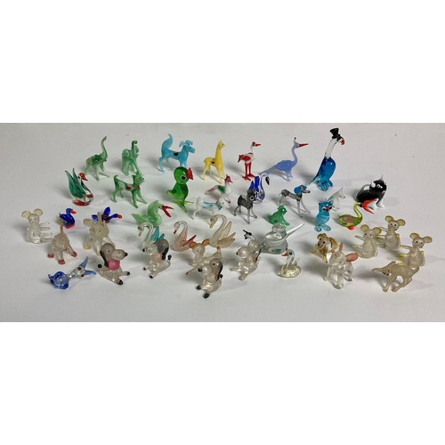 76 - Quantity of Murano style miniature glass animals along with some vintage plastic animals including S... 