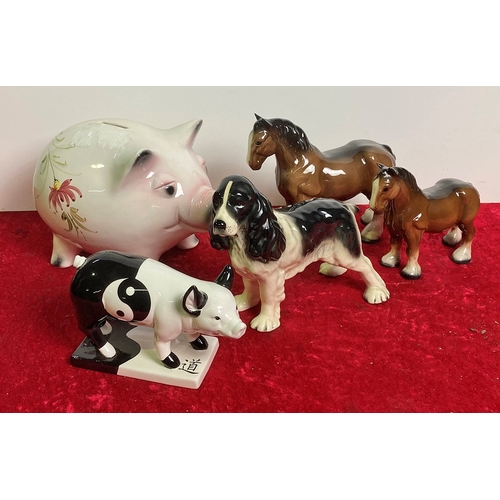 81 - Pottery animals inc. very large piggy bank, horses, spaniel dog and yin yang pig