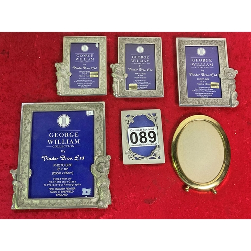 89 - Pewter and brass photo frames