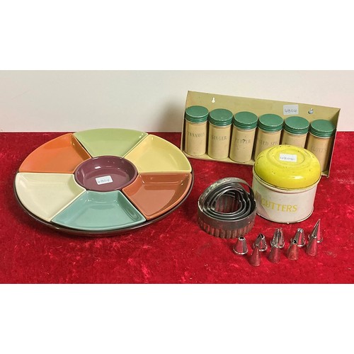 56 - Vintage pastry cutters in tin, spice tins on rack and retro chip & dip dish