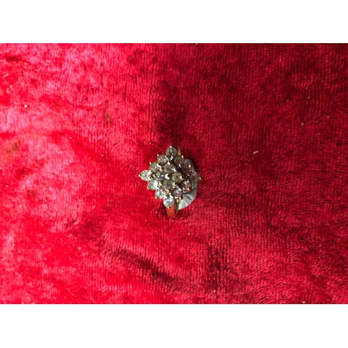 202 - 9ct gold ring with white stones