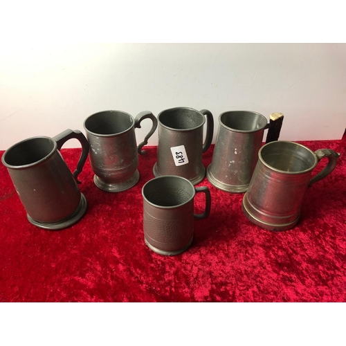 483 - A selection of Pewter beer mugs