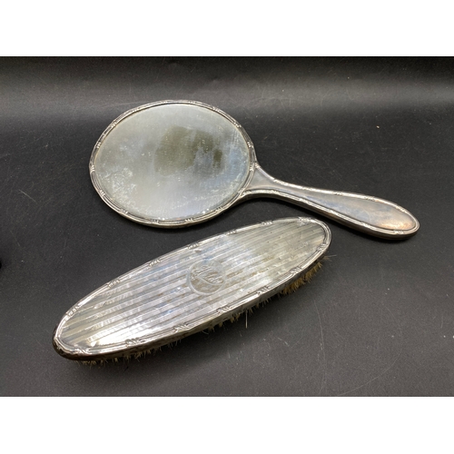 201 - Silver dressing table mirror and brush with matching inscription, Birmingham 1919-20