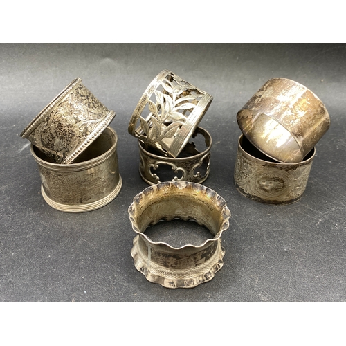 205 - 7 different silver napkin rings, 160g total