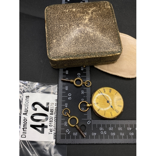 402 - Ladies fob watch with Roman numerals, 18ct gold, metal dust cover, with key and pouch