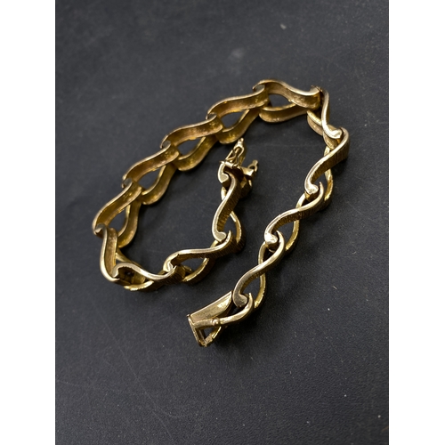 417 - Fancy bark design double row bracelet, 9ct gold, 30.7g