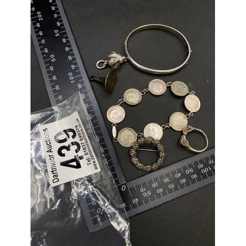 439 - Selection of silver items including a coin bracelet, brooch, seal, bangle etc