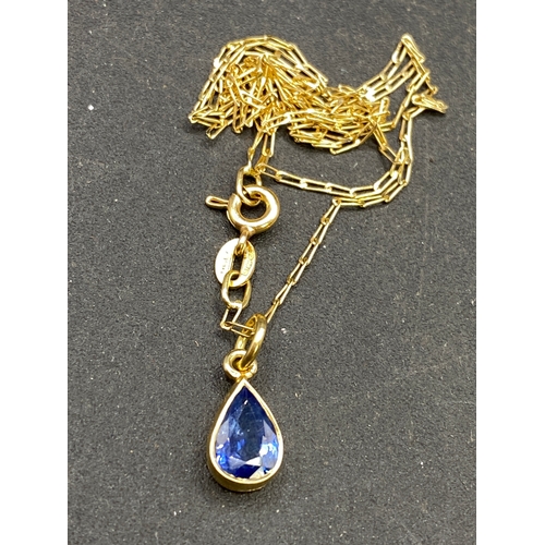 450 - Teardrop blue stone pendant on fancy 18ct gold link chain, 2.6g, 42cm