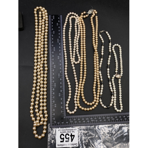 455 - Five pearl necklaces