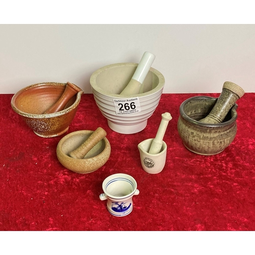 266 - Six pottery pestles and mortars