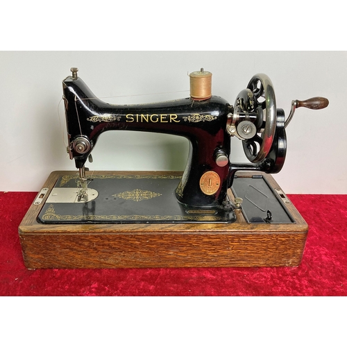 275 - Wooden cased vintage Singer hand sewing machine