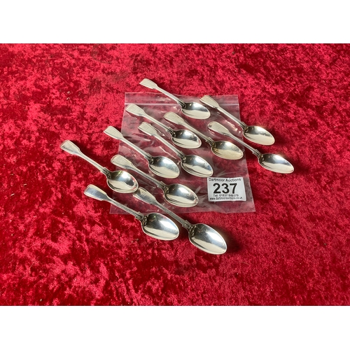 237 - Set of eleven fiddle pattern silver spoons, London 1875-6, 330g