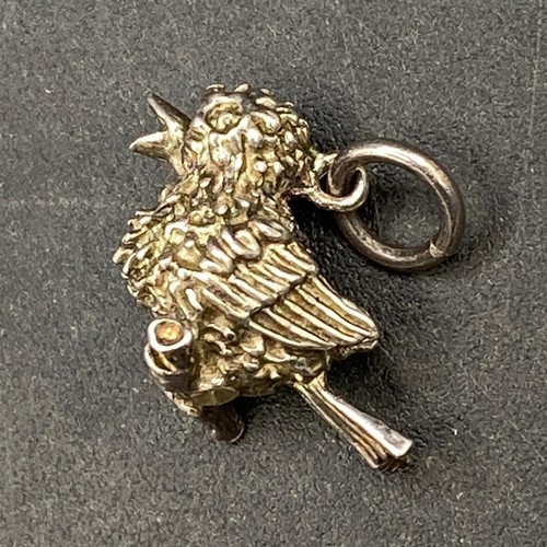 450G - White metal pendant/charm in the form of a finely detailed bird sitting on a branch