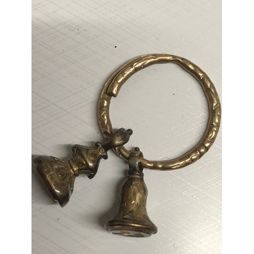 434 - Antique split ring with two miniature fobs