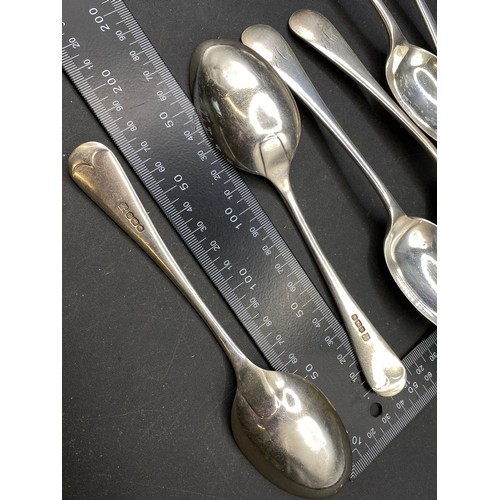 234 - Set of twelve silver spoons, London 1928-9, 660g