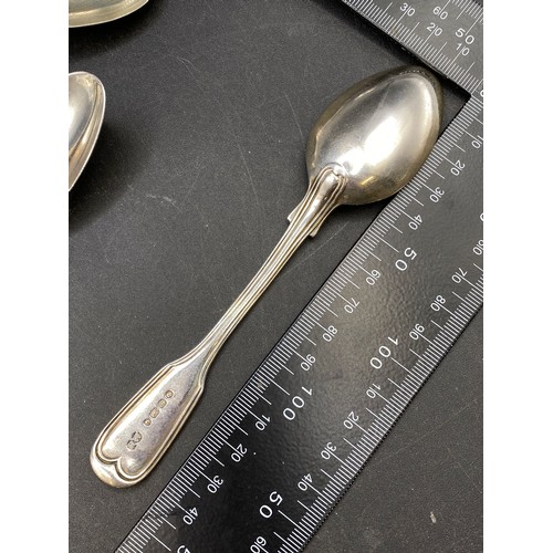 237 - Set of eleven fiddle pattern silver spoons, London 1875-6, 330g