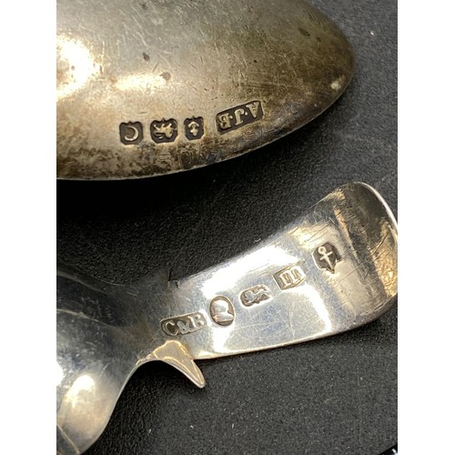 247 - Two silver caddy spoons, spoon with loop handle Birmingham 1932-3, kidney shaped spoon Birmingham 18... 