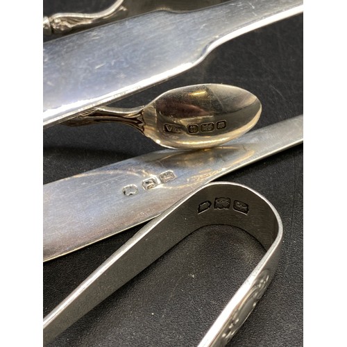 250 - Three pairs of silver sugar tongs, 80g