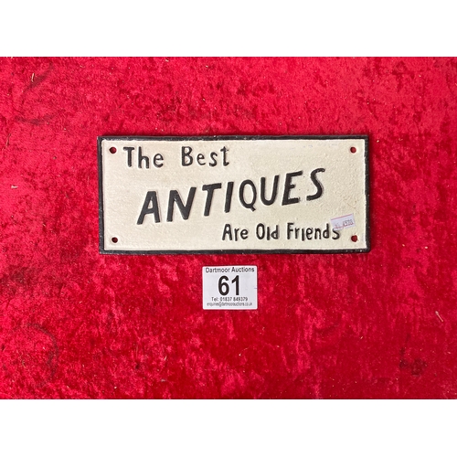 61 - Cast Iron Antique Sign