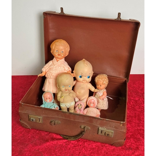 118 - Small vintage suitcase containing vintage dolls
