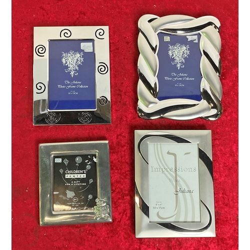 131 - 4 boxed white metal picture frames