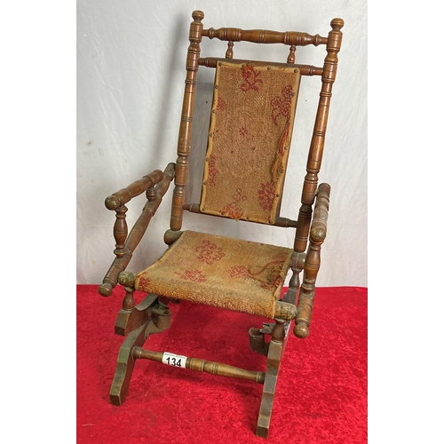 134 - Antique turned wood child's Rocking Chair in need of restoration