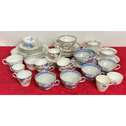 140 - A selection of china tea cups, saucers and plates including Adderley, Masons, Ainsley and Spode