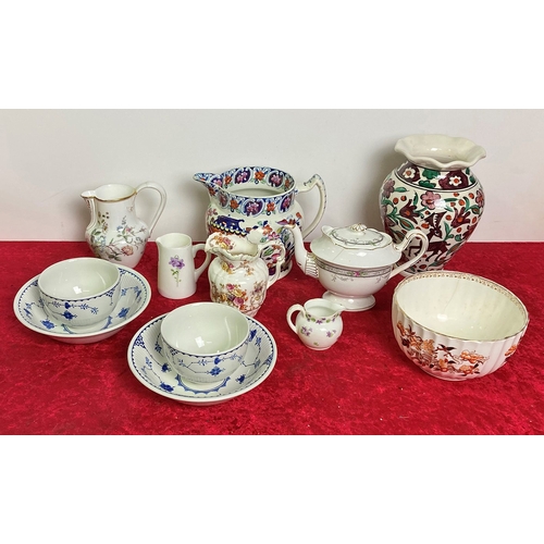 141 - A crate of mixed china, jugs, bowls and a vase