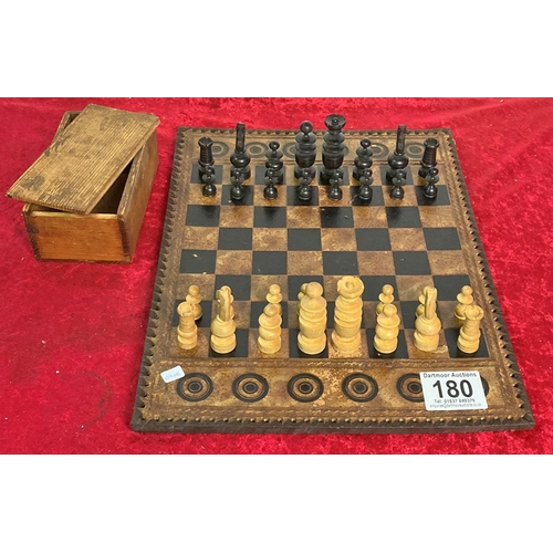 180 - Leather topped chess board with box of turned wooden chess pieces