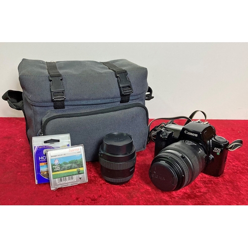 466 - Canon EOS 1000f camera with sigma 70/210mm lens in black canvas bag along with a sigma 35/80mm lens ... 