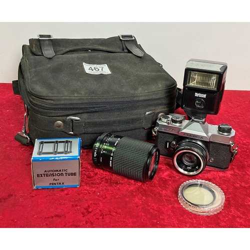 467 - Fujica ST605 SLR camera in black canvas bag along with a 80-200mm lens and accessories all untested.