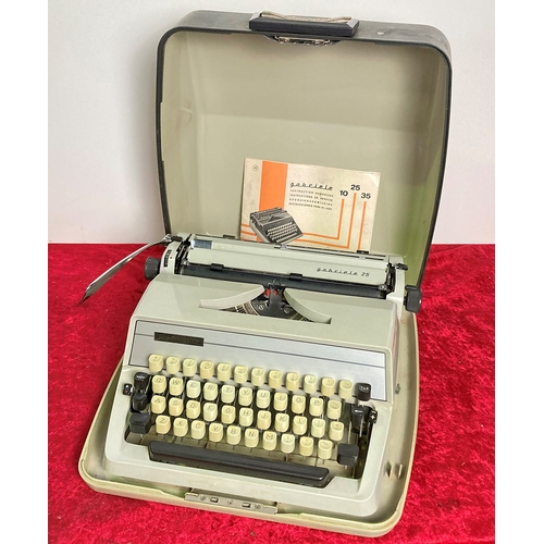 474 - Gabriele 25 typewriter in original case with instruction booklet.