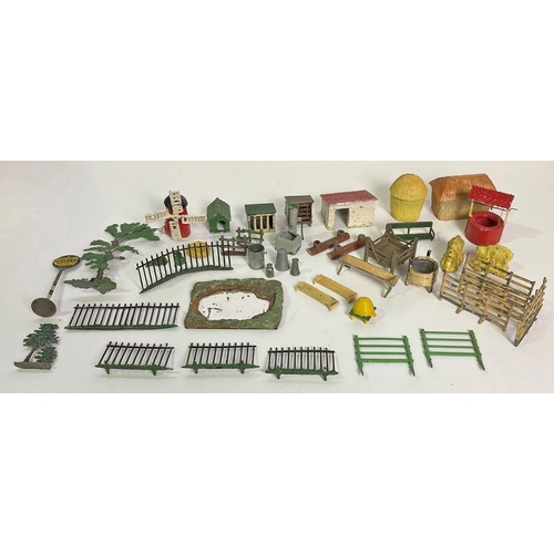 433 - A selection of lead model farm accessories including barns, fencing and trees plus more