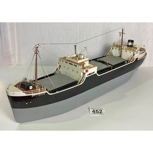 452 - A model container ship on stand approximately 27.5 inches long