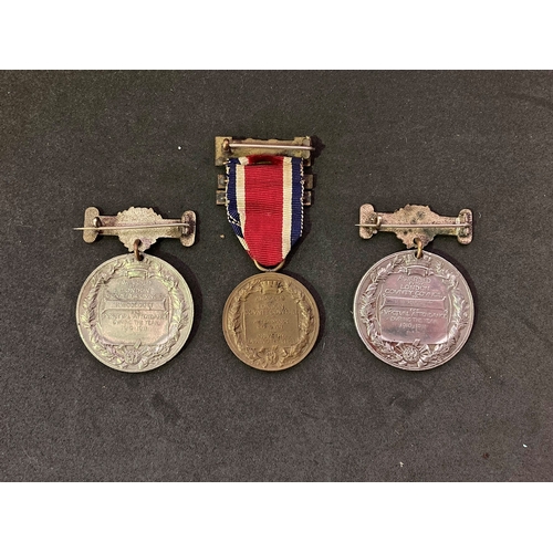 271 - Three King's medals awarded by London County Council in 1911 and 1915