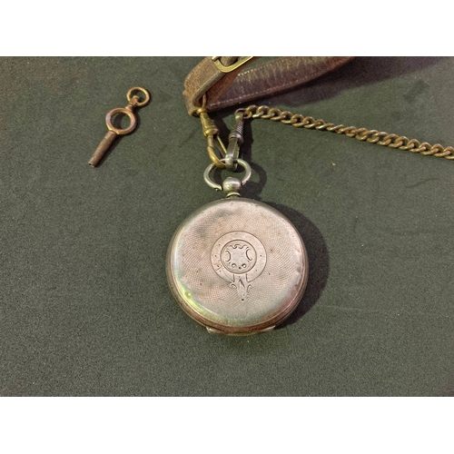 258 - Silver pocket watch by R Dillon of Waterford. Second hand loose and a chip to glass. With key and le... 